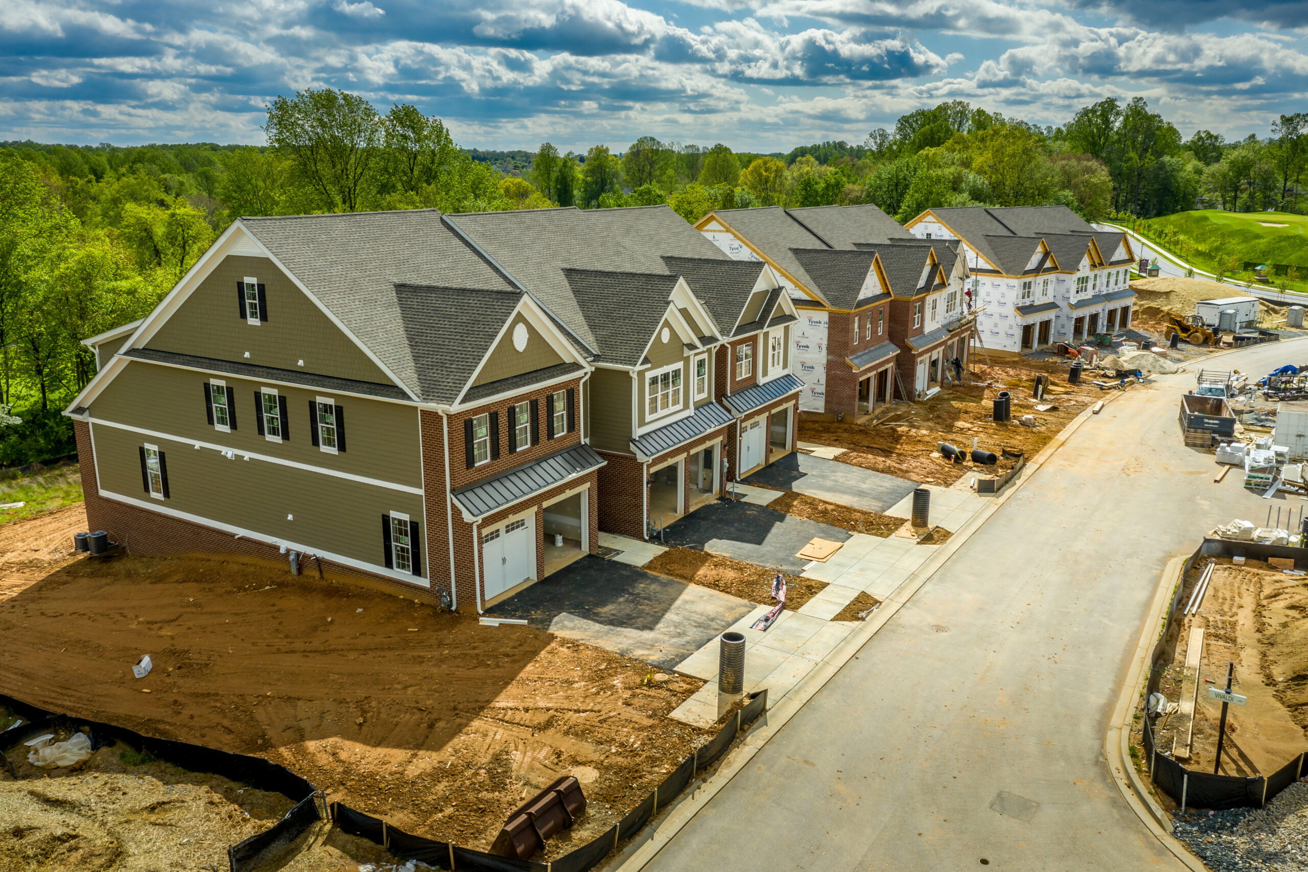 Post-construction cleaning crew finishing a commercial build